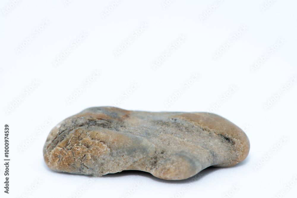 Macro Photo of Pebble Stones on White Background Macro Photo of Pebble Stones on White Background