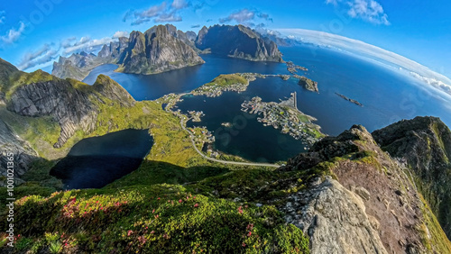 Fisheye view of typical Lofoten lanscape with the ocean, mountains and the village of Reine. 