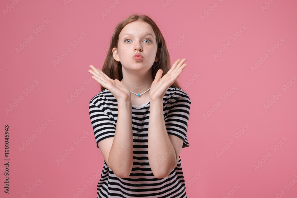 Portrait of teenage girl on pink background Portrait of teenage girl on pink background