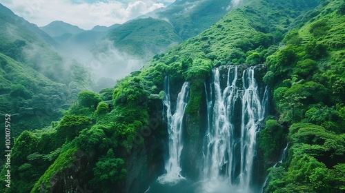 Beautiful Spring Green Natural Landscape with Waterfall: A Perfect Tourism Destination. Enjoy the Serenity and Beauty.