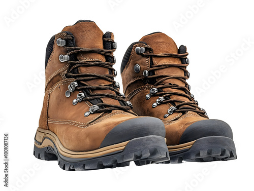 Pair of sturdy brown hiking boots on a white isolated background, ideal for outdoor adventures and exploration. photo