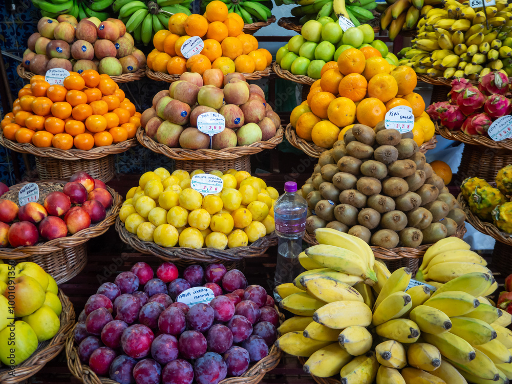 Fruit market in Madeira, variety of fruits and vegetables Fruit market in Madeira, variety of fruits and vegetables