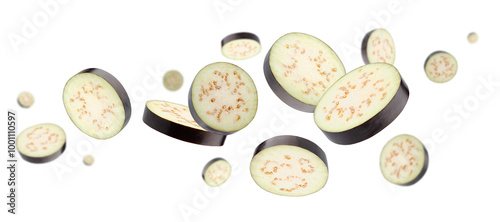 Sliced pieces of eggplant fly and levitate in space. Isolated on white