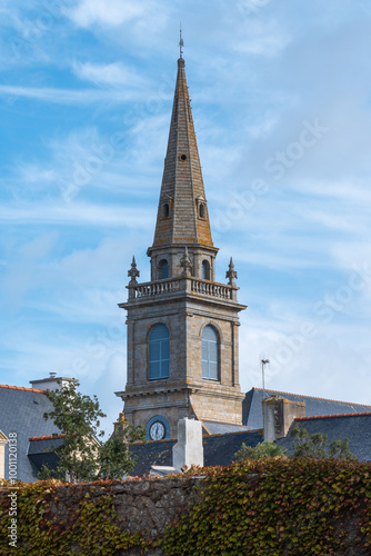 Catholic church with towering bell in coastal Port Louis, Brittany, France