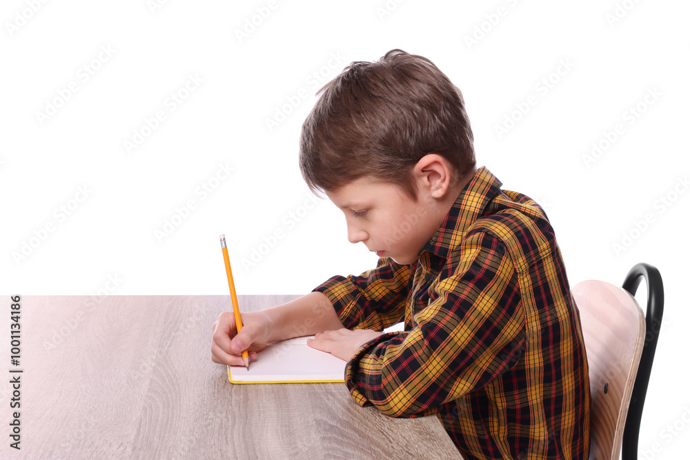 Boy with incorrect posture and notebook at wooden desk on white background Boy with incorrect posture and notebook at wooden desk on white background