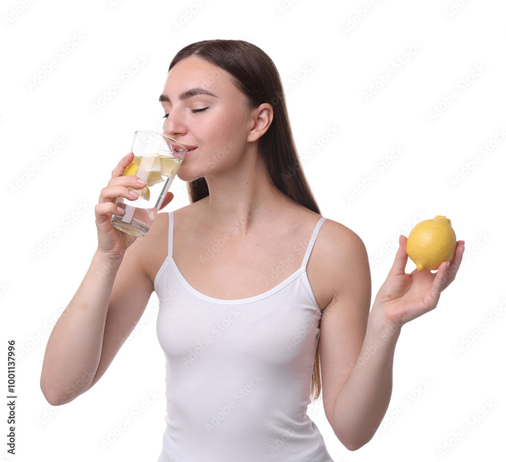 Woman with glass of lemon water and fruit on white background