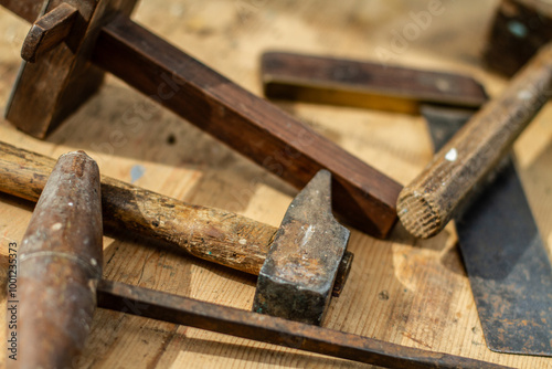 tools hammer and nails on wood photo