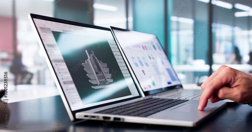 Male Engineer Developing Mechanical Parts Using 3D CAD Software On Laptop Male Engineer Developing Mechanical Parts Using 3D CAD Software On Laptop