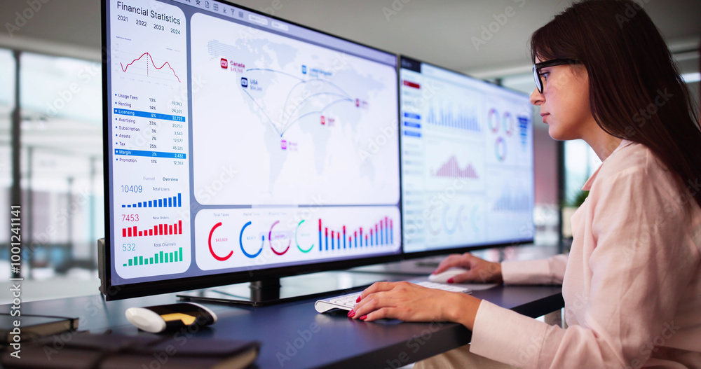 Analyst Woman Looking At Business Data