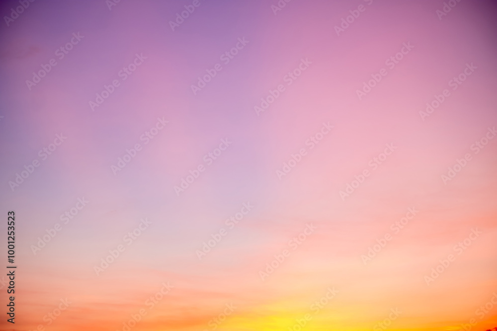 Obraz premium Beautiful , luxury soft gradient orange gold clouds and sunlight on the blue sky perfect for the background, take in everning,Twilight, Large size, high definition landscape photo