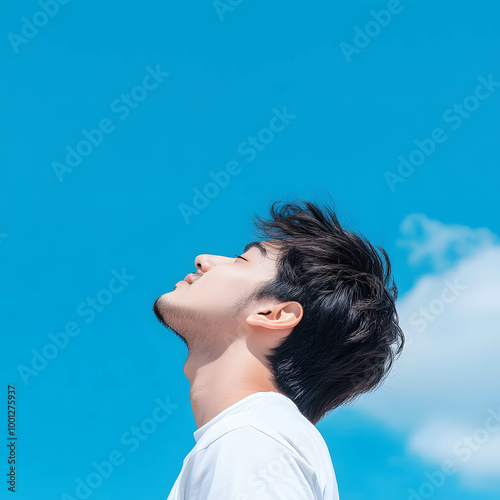 A person with wind blowing through their head depicting relaxed and free thoughts. photo