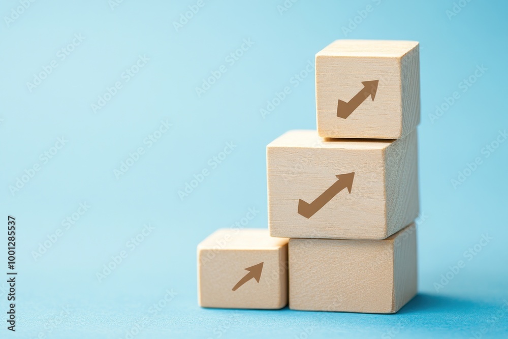 Obraz premium Stacked Wooden Cubes with Upward Arrows