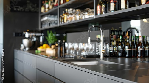 Modern kitchen bar with sink and shelves filled with bottles.