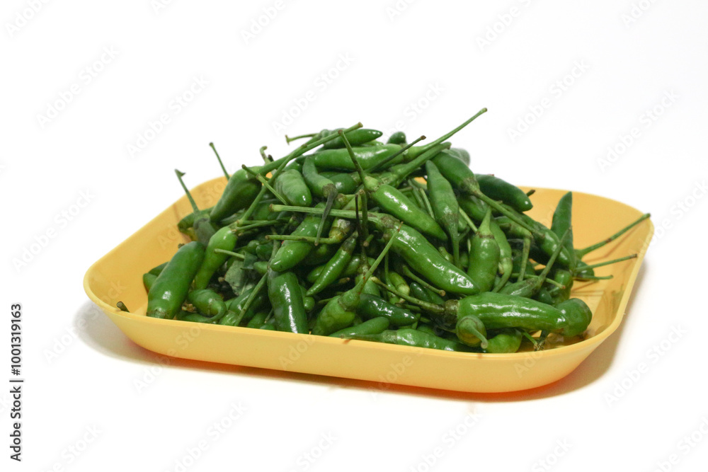 Cabe rawit hijau. Green bird eye Chilli or Green cayenne pepper isolated on white background Cabe rawit hijau. Green bird eye Chilli or Green cayenne pepper isolated on white background