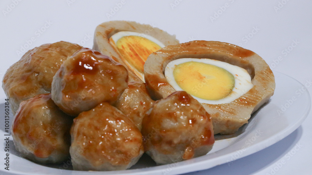 Pentol is a typical Indonesian spicy snack made from beef and tapioca flour. Pentol is a typical Indonesian spicy snack made from beef and tapioca flour.