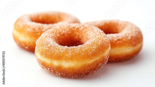 Delicious sugar-coated donuts on a white background.