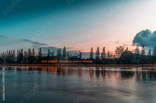 The riverside of the Praek Tuek Chhu River in Kampot in Cambodia at sunset photo