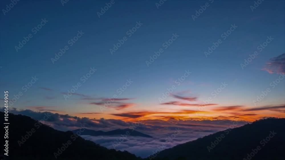 Sunrise emerging from behind mist-covered mountains. dramatic mountain landscapes timelapse Sunrise emerging from behind mist-covered mountains. dramatic mountain landscapes timelapse