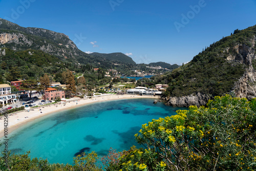 Agios Spiridon Beach during sunny day, Ionian Sea coast during summer. Palaiokastritsa Corfu Greece 