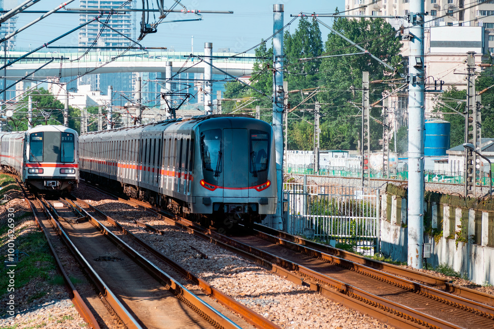 A subway train running on ground tracks in Shanghai, China. A subway train running on ground tracks in Shanghai, China.