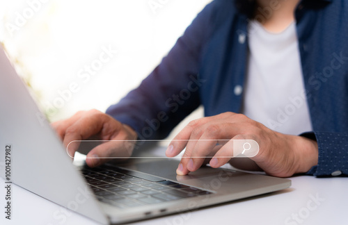 Businessman hands working with laptop computer device on office desk. Using search web browsing Internet data Information network. Business digital technology concept.