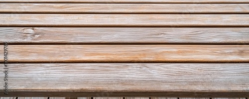 Teak wood grain texture on an outdoor bench, natural weathering, soft light creating a warm glow, focus on the detailed grain patterns, organic shapes, and earthy tones