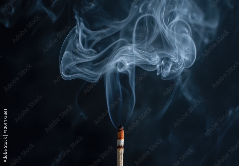 white smoke rising from the tip of an incense stick white smoke rising from the tip of an incense stick