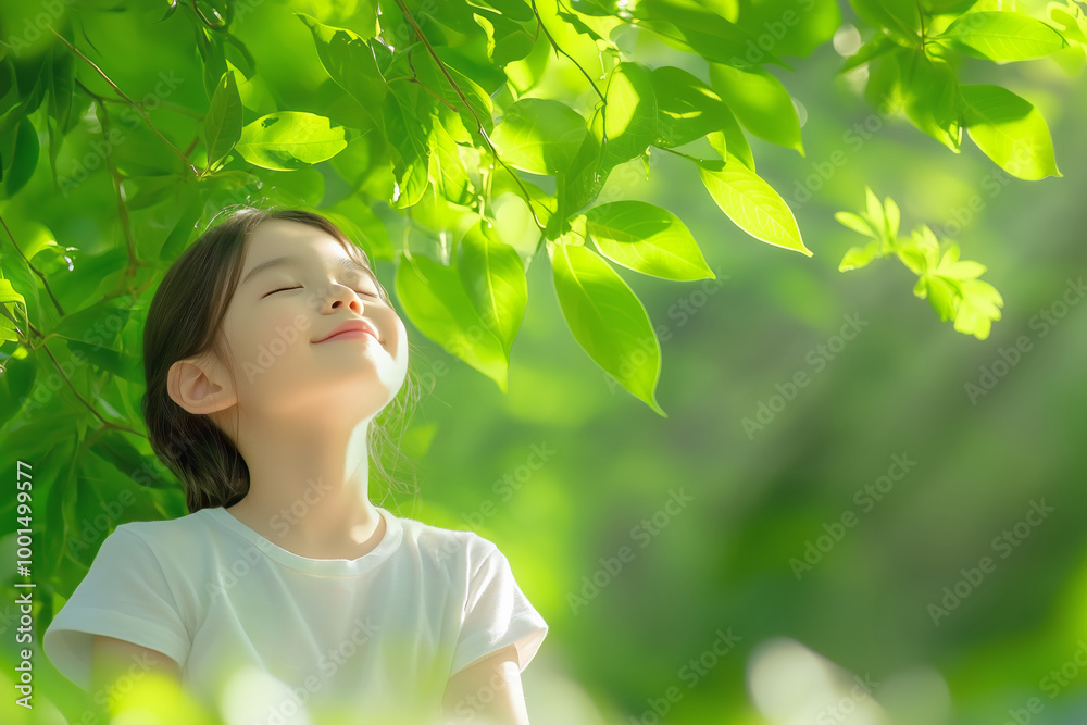Young girl enjoys nature while surrounded by vibrant green leaves on a sunny day Young girl enjoys nature while surrounded by vibrant green leaves on a sunny day
