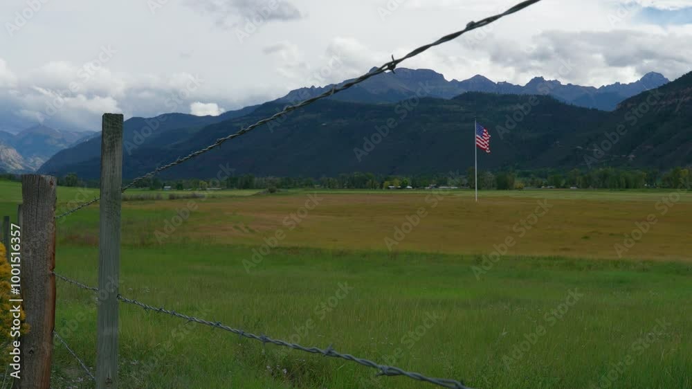 The Great American West American Flag On Ranch In Mountains