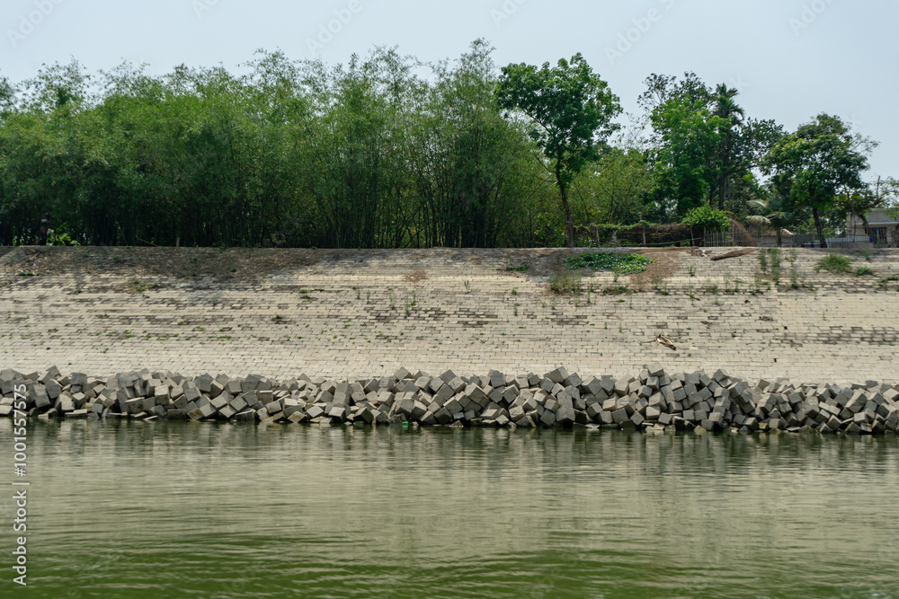 concrete cubes which serve as coastal protection from river erosion.