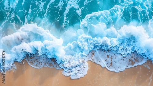 Blue sea wave on sandy beach background. Top view. Copy space