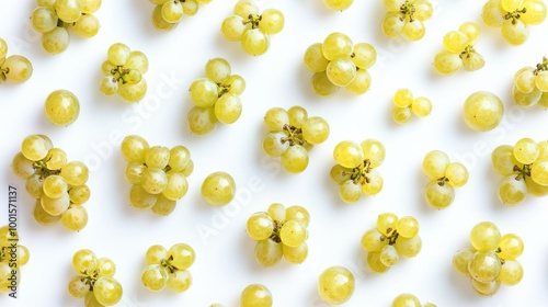 A lot of Shine-Muscat grapes and cut Shine-Muscat grapes on a white background. White grapes. Japanese grapes. View from above.