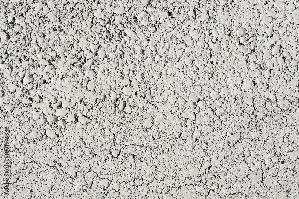 Detail of an asphalt road painted in white