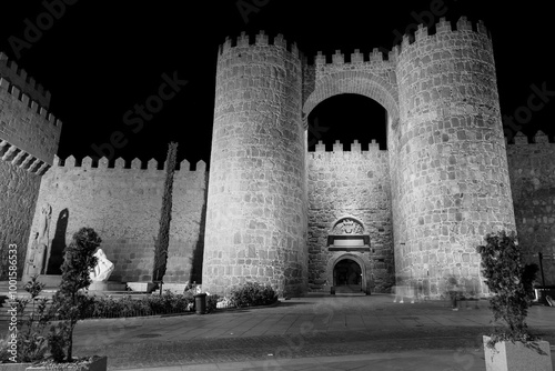 Gate of The Alcazar of the walls at night in Avila city