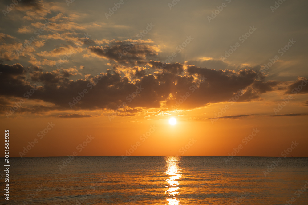 pinkish blue evening sky against the sea pinkish blue evening sky against the sea