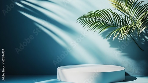 An elegantly simple white podium setup with the serene shadow of a palm leaf cast on a smooth blue background : Generative AI