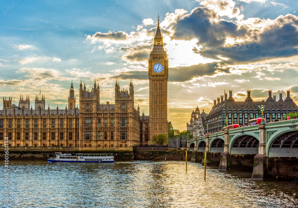 Naklejka premium Houses of Parliament with Big Ben tower and Westminster bridge at sunset, London, UK