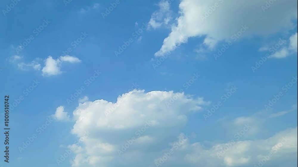 Cloudscape, a Timelapse of a beautiful Blue Sky with white clouds, for a background
Cloudscape, a Timelapse of a beautiful Blue Sky with white clouds, for a background
