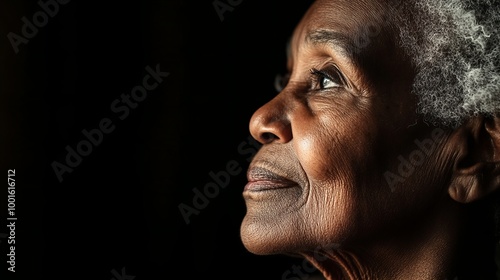 portrait of an old, black woman, concept of old age, ageism and loneliness 