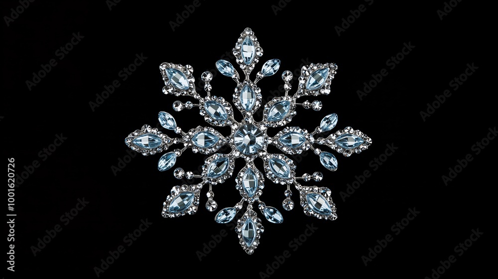 Ornate Snowflake Brooch with Light Blue and Clear Gemstones on Black Banner Background