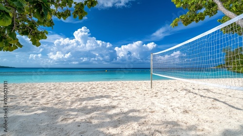 Beautiful beach with a volleyball net under a bright blue sky on a sunny day