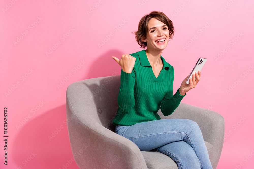 Photo of good mood woman brown bob hair blogger direct finger empty space using smartphone repost medias isolated on pink color background Photo of good mood woman brown bob hair blogger direct finger empty space using smartphone repost medias isolated on pink color background