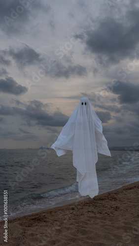 ghost floating on the shore of the beach where there are no people, white savannah floating, ghost with black eyes on a seabed