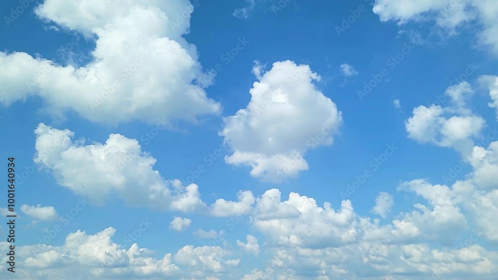 Cloudscape, a Timelapse of a beautiful Blue Sky with white clouds, for a background
Cloudscape, a Timelapse of a beautiful Blue Sky with white clouds, for a background