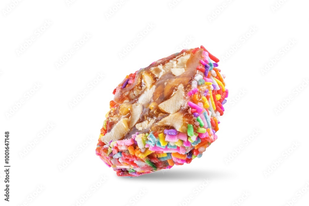 Multi-colored sprinkles peanuts honey rahat lokum on white isolated background Multi-colored sprinkles peanuts honey rahat lokum on white isolated background