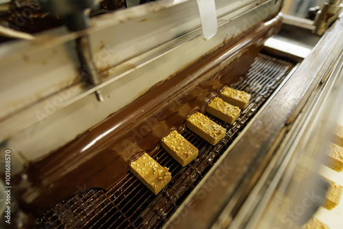 Conveyor belt with candy factory production.