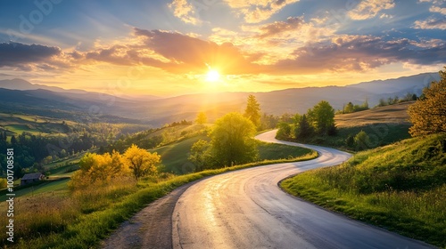 A winding road leading through a picturesque landscape with rolling hills and a bright sun