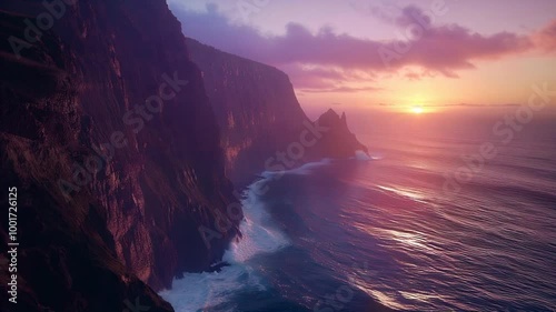 Aerial view of dramatic cliffs and ocean at sunset in Madeira Portugal