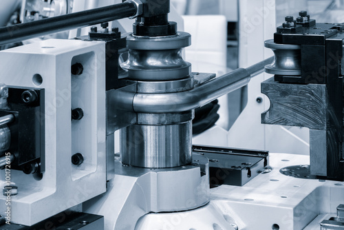 Photos industrial device for bending of metal pipes and plates,  industrial concept bac
