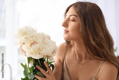 Beautiful young woman with ...